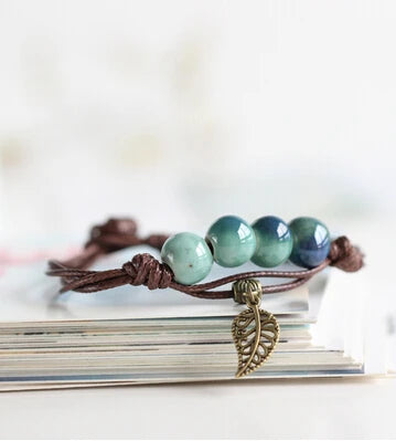 Earth style Bracelet with metal leaf