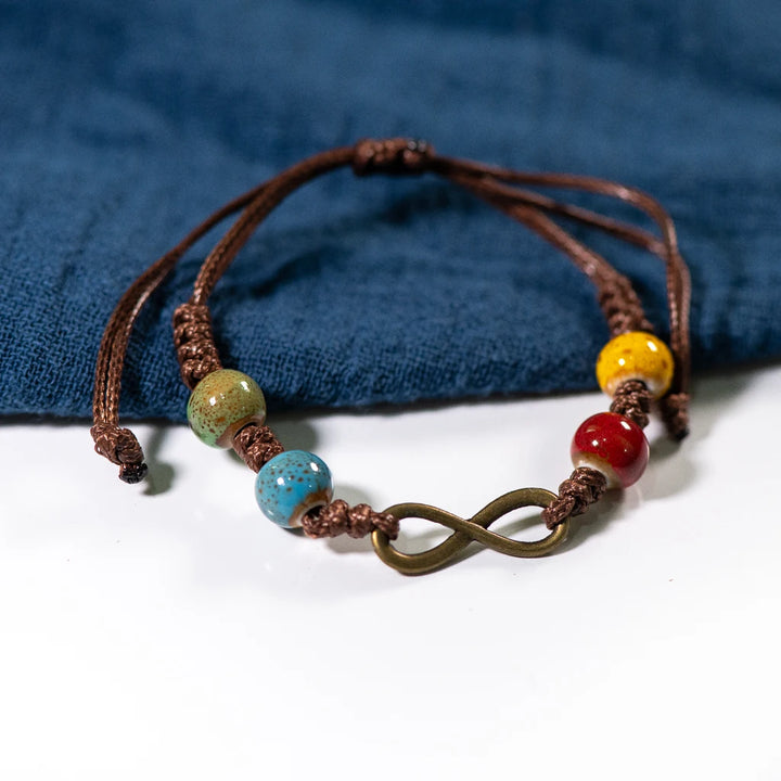 Infinity Bracelet with mix color beads on brown strand