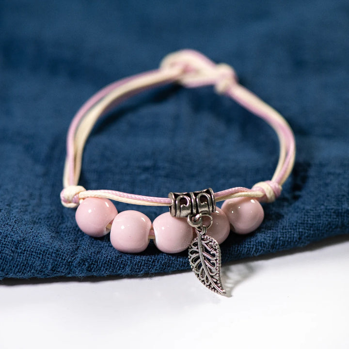 Bohemian ceramic bracelet with pink beads.