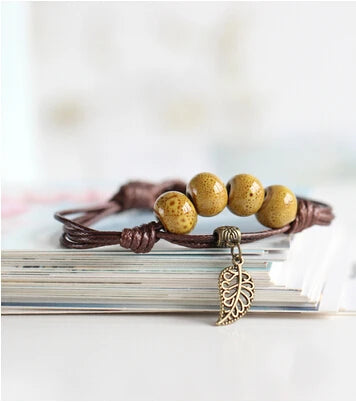 Ethnic bead bracelet made from ceramic with traditional style patterns.