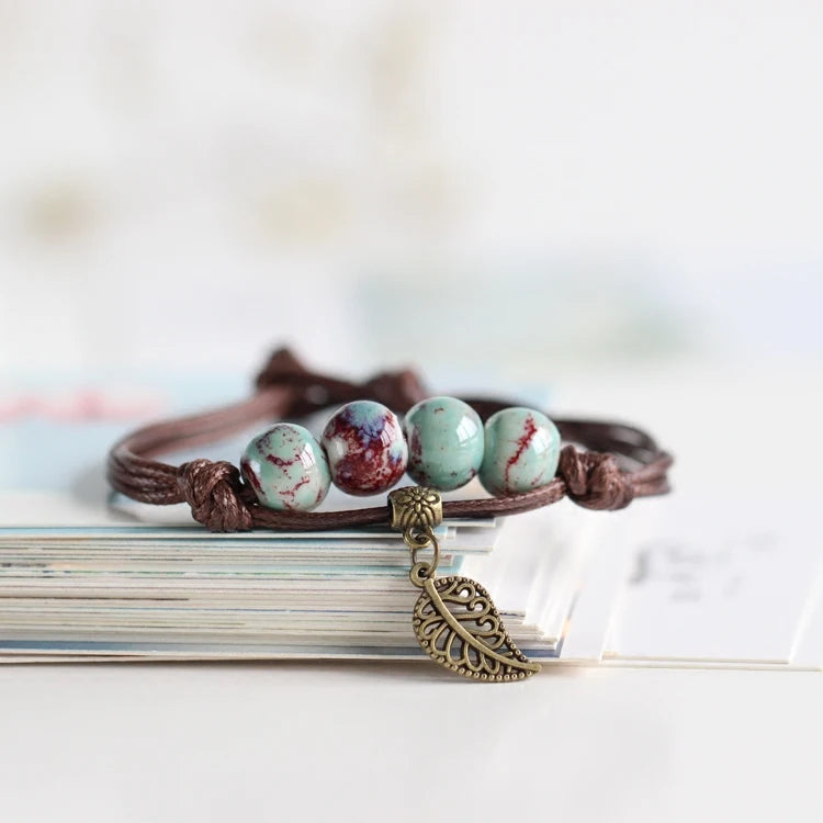 Vintage ceramic bead bracelet with  strand and easy-hook clasp.